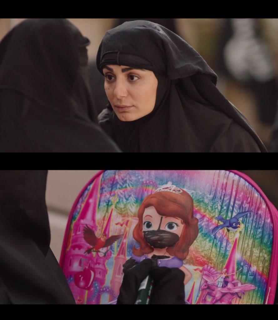 Khansa (portrayed by Dima Aljundi), one of the main female officers of the ḥisba (moral accountability police forces), confronts a small girl about the depiction of Disney characters on her bag.